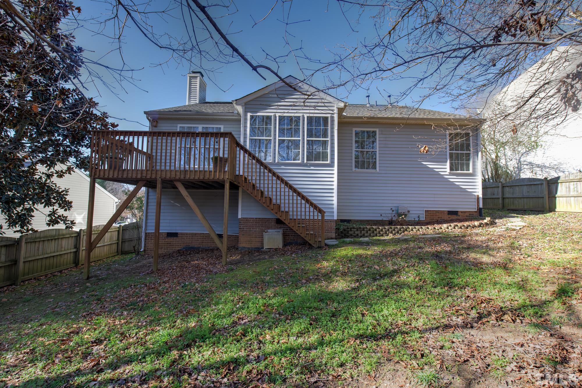 6809 Edwell Court Raleigh, NC 27617 - Photo 24 of 26 front view of a house with a yard
