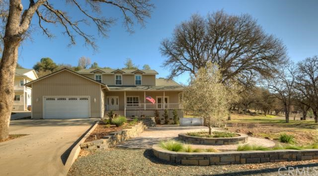 20280 Powder Horn Road Hidden Valley Lake, CA 95467 - Photo 1 of 1 Front of home with open space to the lot to the right