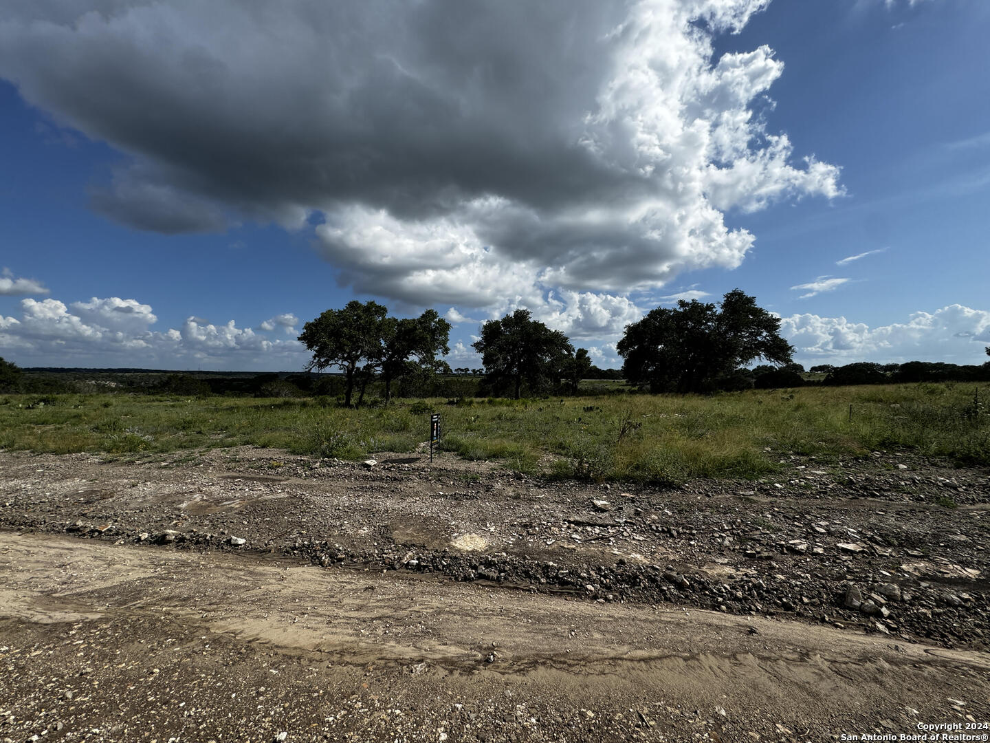 Lot 91 Loma Vista Ranch Phase 4 Kerrville, TX 78028 - Photo 4 of 7 a view of a garden with a building in the background