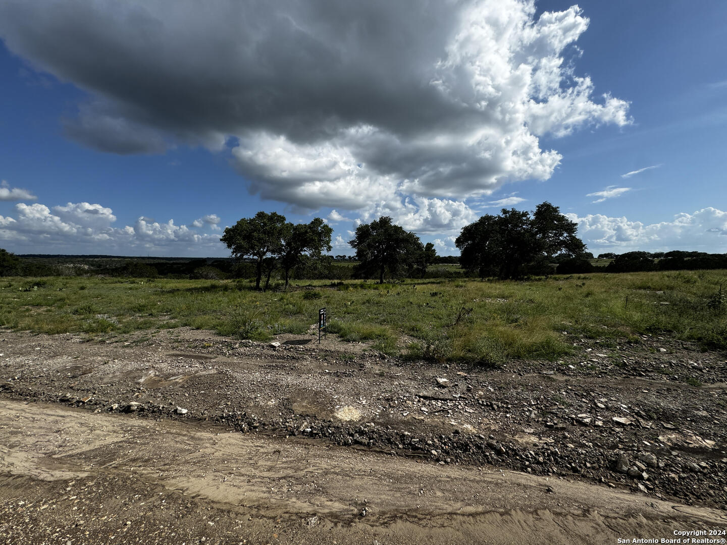 Lot 91 Loma Vista Ranch Phase 4 Kerrville, TX 78028 - Photo 6 of 7 a view of a golf course with a lake
