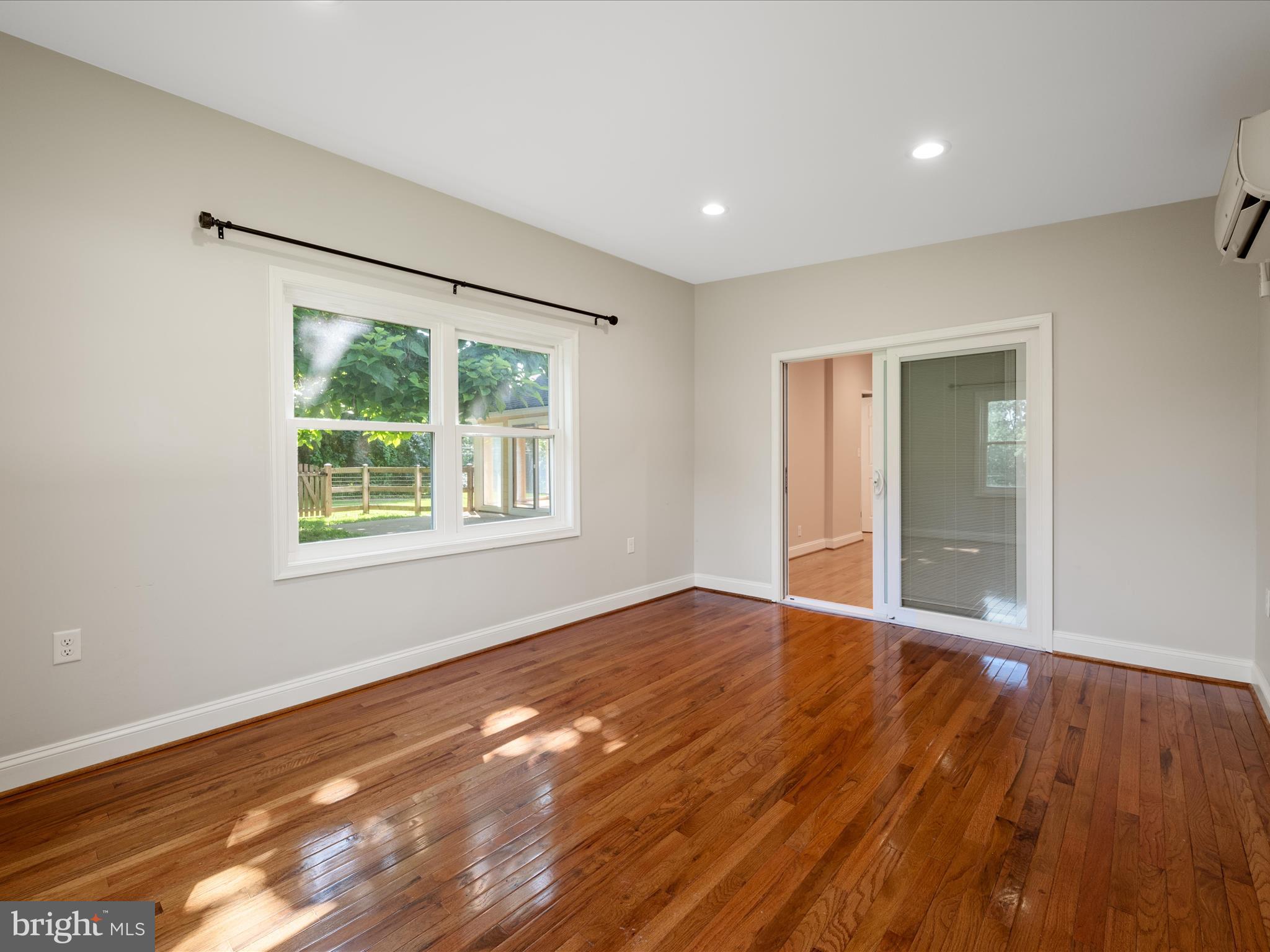 87 Old Waterloo Road Boyce, VA 22620 - Photo 25 of 76 a view of an empty room with wooden floor and a window