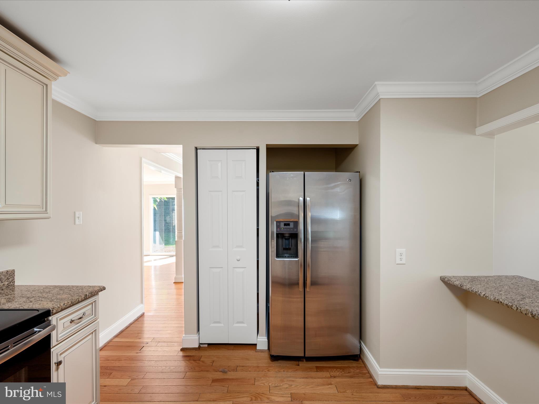 87 Old Waterloo Road Boyce, VA 22620 - Photo 29 of 76 a view of a kitchen with a refrigerator and wooden floor