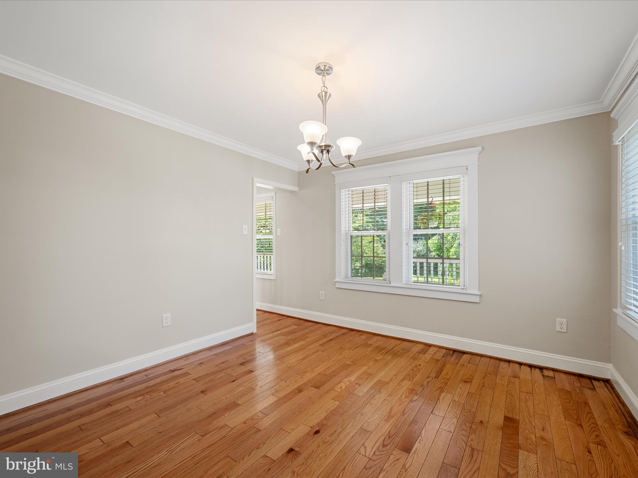 87 Old Waterloo Road Boyce, VA 22620 - Photo 31 of 76 a view of an empty room with wooden floor and a window
