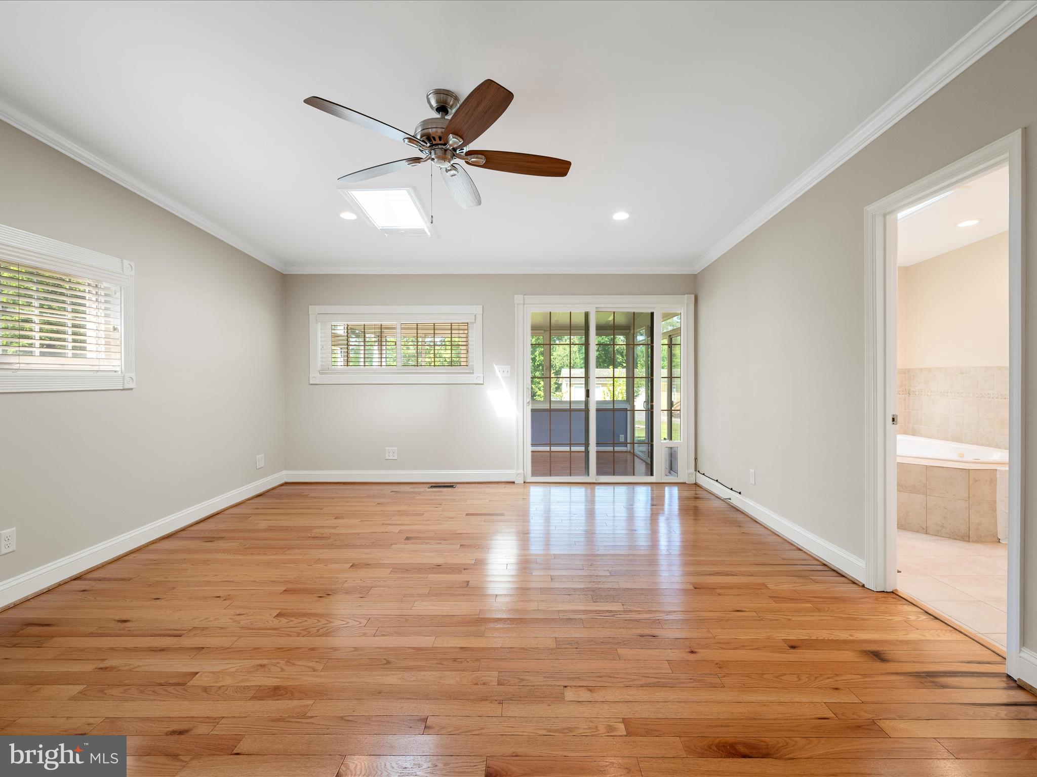 87 Old Waterloo Road Boyce, VA 22620 - Photo 33 of 76 a view of an empty room with wooden floor and a window
