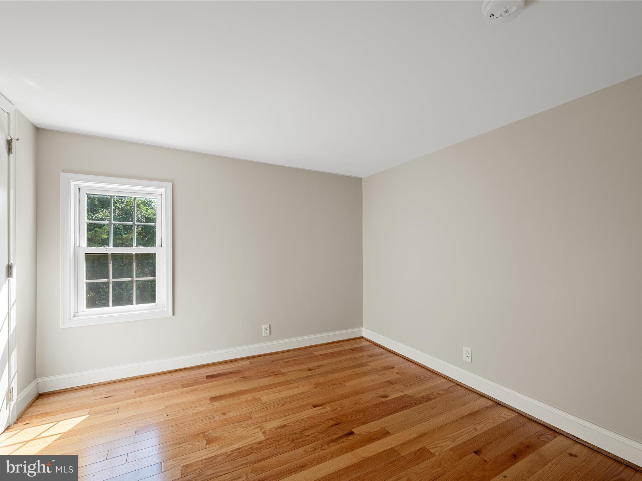 87 Old Waterloo Road Boyce, VA 22620 - Photo 43 of 76 an empty room with wooden floor and windows