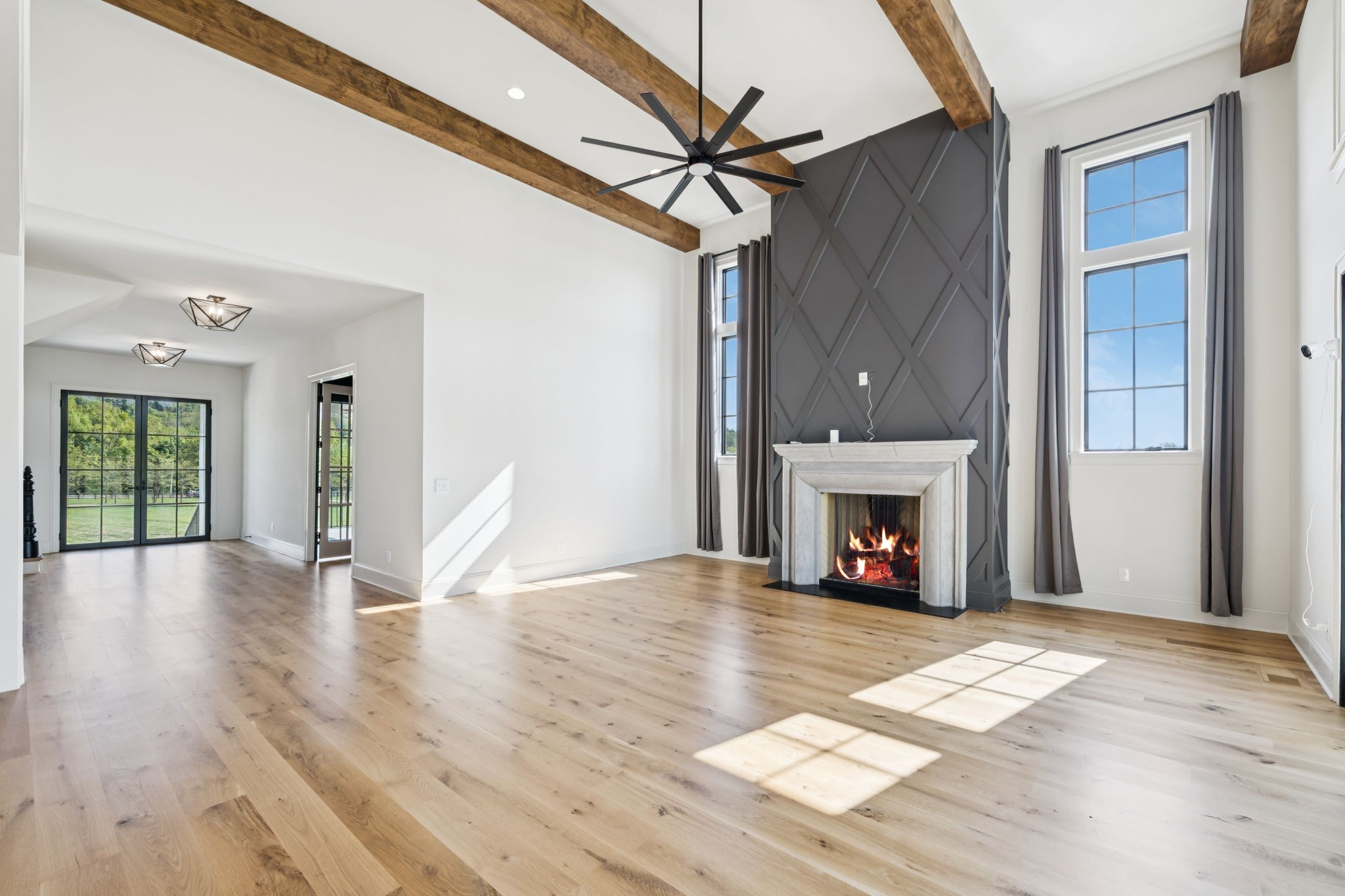 2245 Skinner Road Arrington, TN 37014 - Photo 25 of 98 a view of livingroom with fireplace wooden floor and window
