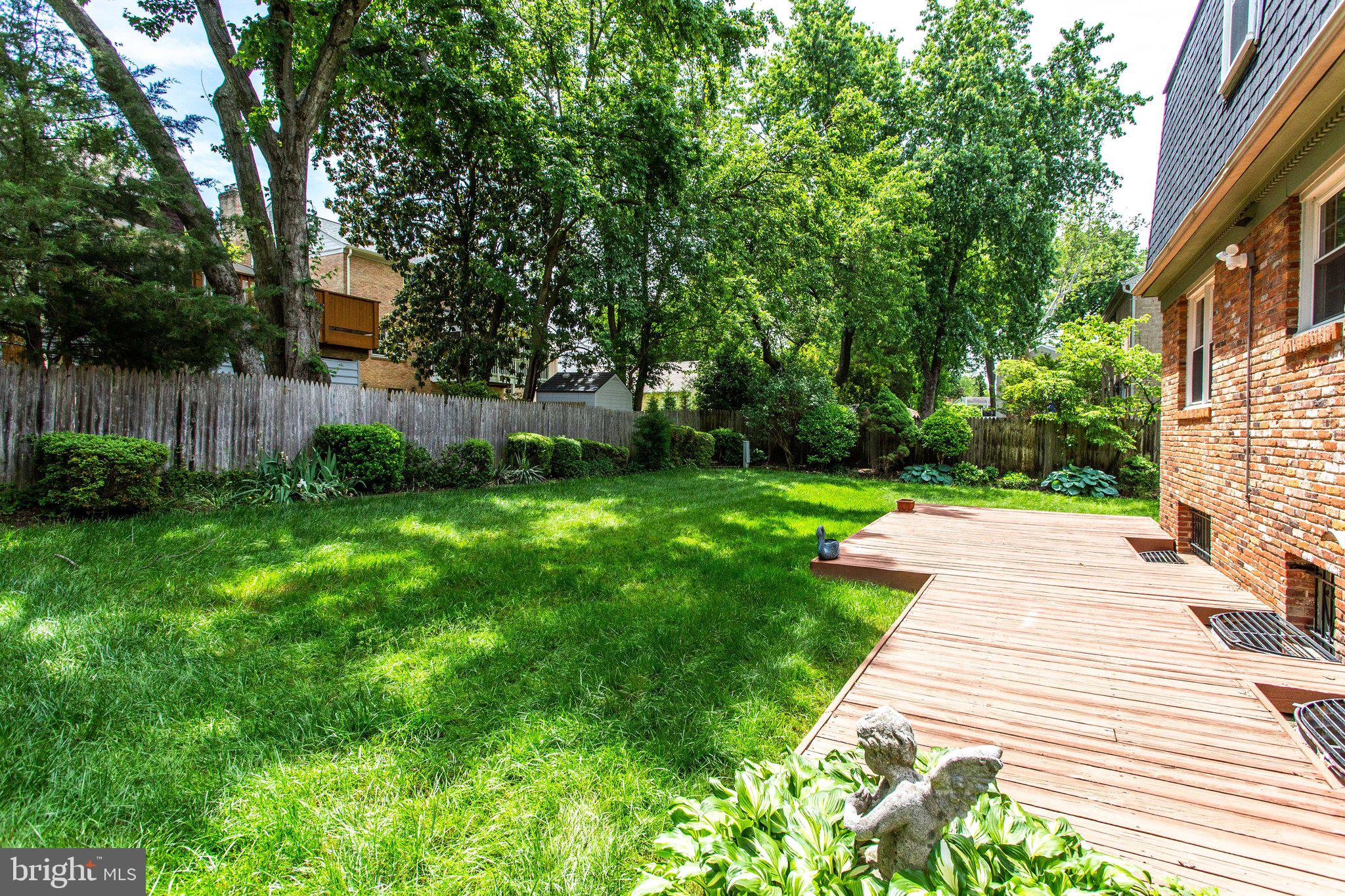 1225 Colonial Road McLean, VA 22101 - Photo 37 of 44 Tranquil backyard with Deck framed by trees