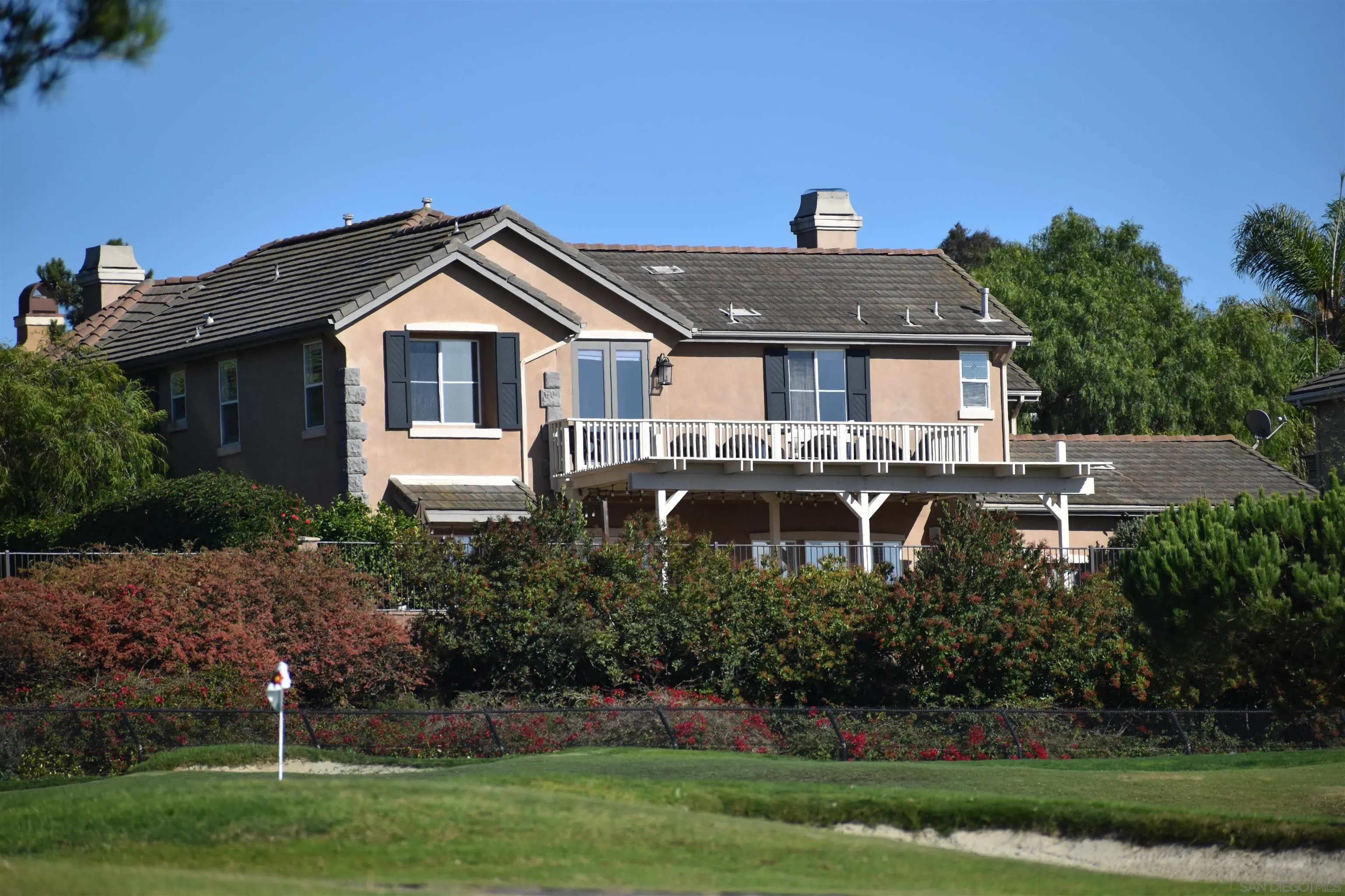1463 Paseo De Las Flores Encinitas, CA 92024 - Photo 27 of 28 a front view of a house with a yard
