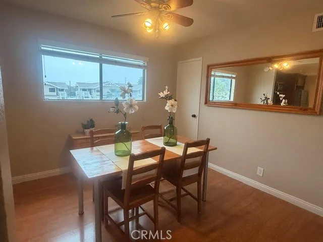 a kitchen with stainless steel appliances granite countertop a sink and a stove