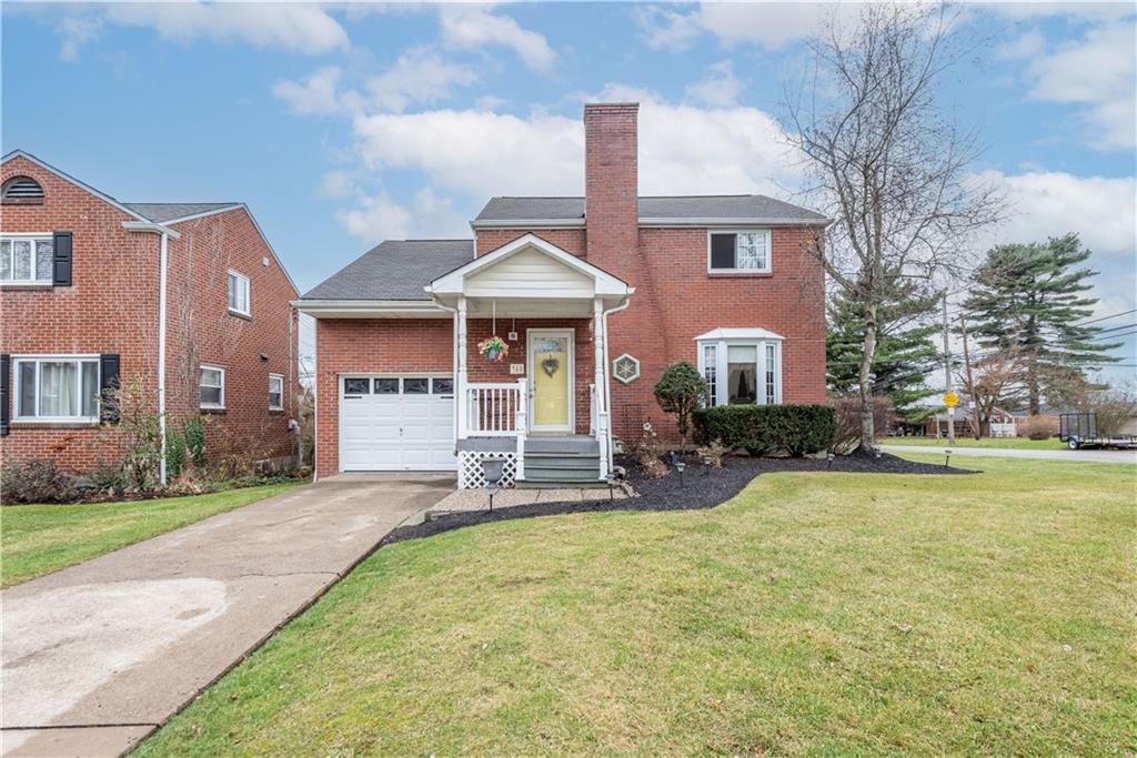 340 Spring Valley Road Pittsburgh, PA 15243 - Photo 1 of 44 a front view of a house with patio and garden