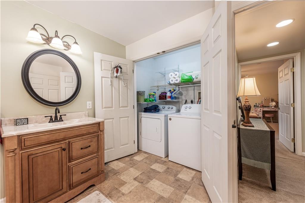 340 Spring Valley Road Pittsburgh, PA 15243 - Photo 19 of 44 a en suite bathroom with a toilet sink and mirror