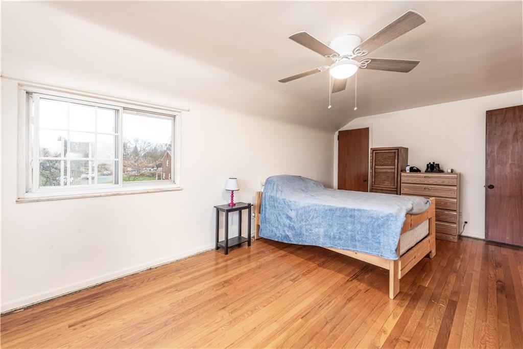 340 Spring Valley Road Pittsburgh, PA 15243 - Photo 29 of 44 a bedroom with a bed and window