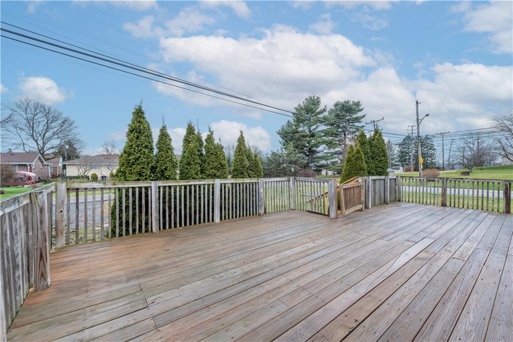 340 Spring Valley Road Pittsburgh, PA 15243 - Photo 40 of 44 a view of a deck with a big yard and wooden floor