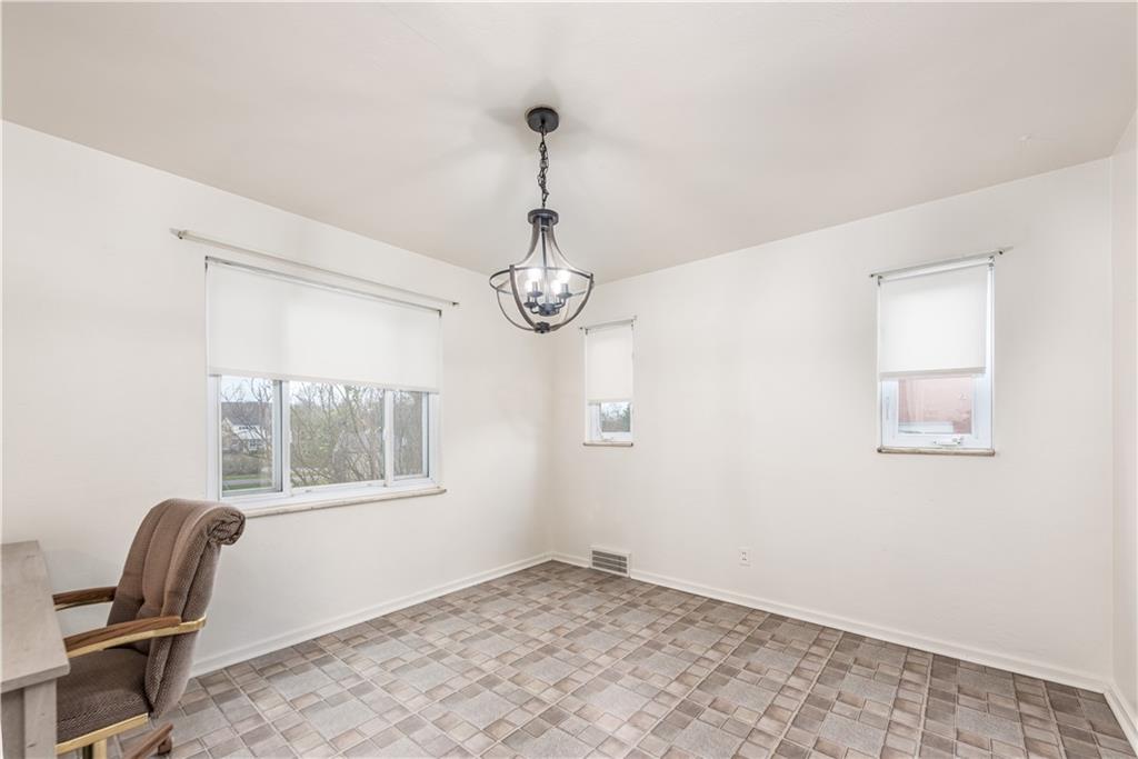 340 Spring Valley Road Pittsburgh, PA 15243 - Photo 9 of 44 a view of a room with a window and wooden floor