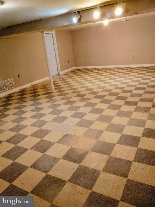 9110 Meadow Heights Road Randallstown, MD 21133 - Photo 18 of 21 a view of a bathroom with a sink and a shower