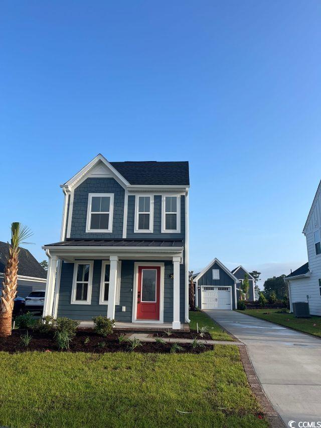 2620 Rowyn Street Longs, SC 29568 - Photo 1 of 1 View of front of home with an outbuilding, covered
