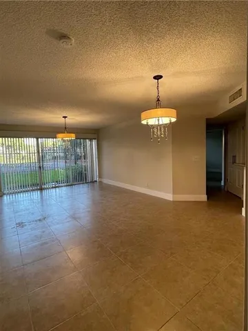 $3,000 | 8801 Wiles Road, Unit 108, Coral Springs, FL 33067
