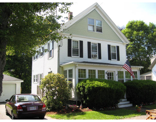 39 Maple Street Hamilton, MA 01982 - Photo 1 of 1 a front view of a house with a garden