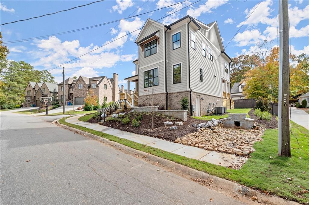 3794 Wynn Walk Brookhaven, GA 30341 - Photo 39 of 50 a view of a house with a yard and pathway