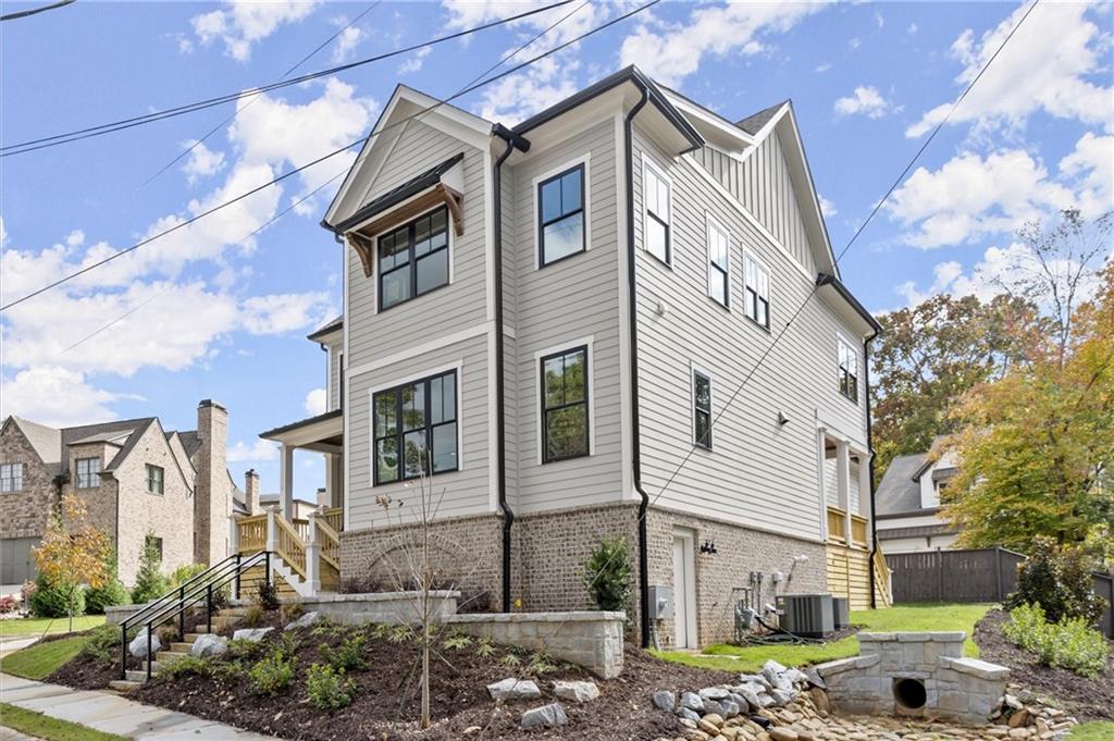 3794 Wynn Walk Brookhaven, GA 30341 - Photo 40 of 50 a front view of a house with a yard