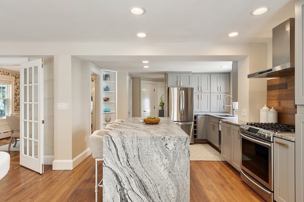 29 Downing Road Lexington, MA 02421 - Photo 13 of 38 a view of a kitchen counter space and wooden floor