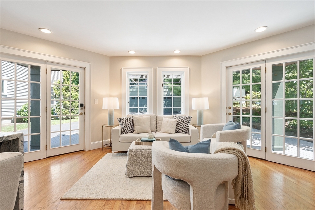 29 Downing Road Lexington, MA 02421 - Photo 28 of 38 a living room with furniture and a large window