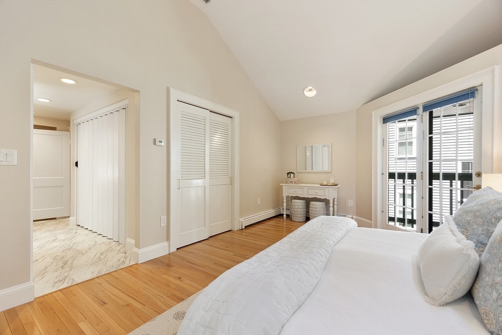 29 Downing Road Lexington, MA 02421 - Photo 31 of 38 a bedroom with a bed and a large window