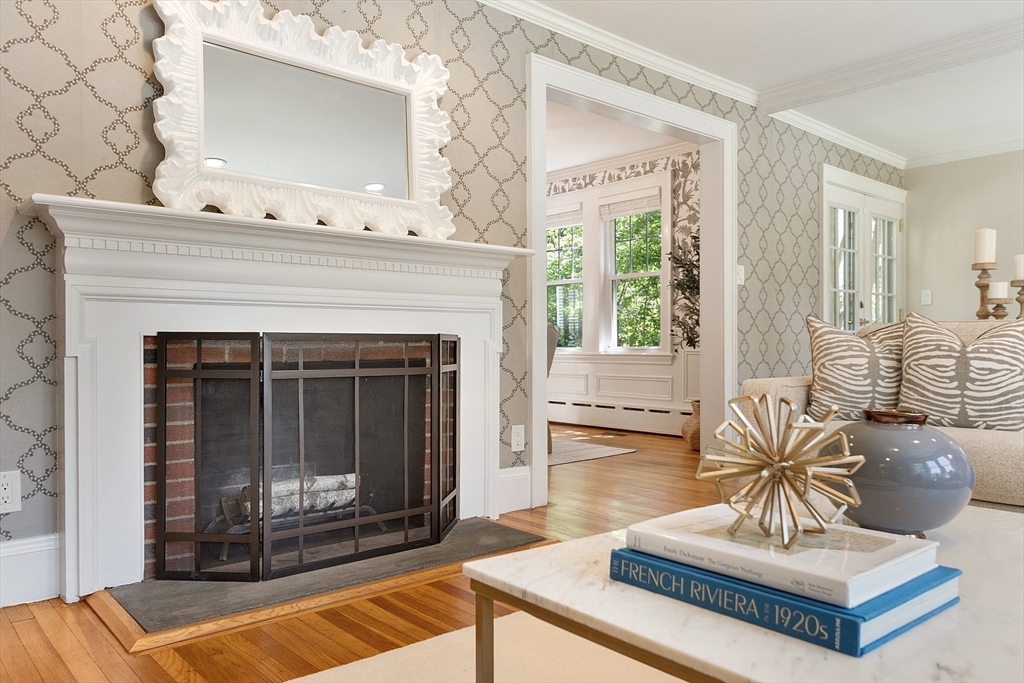 29 Downing Road Lexington, MA 02421 - Photo 7 of 38 a living room with furniture and a fireplace