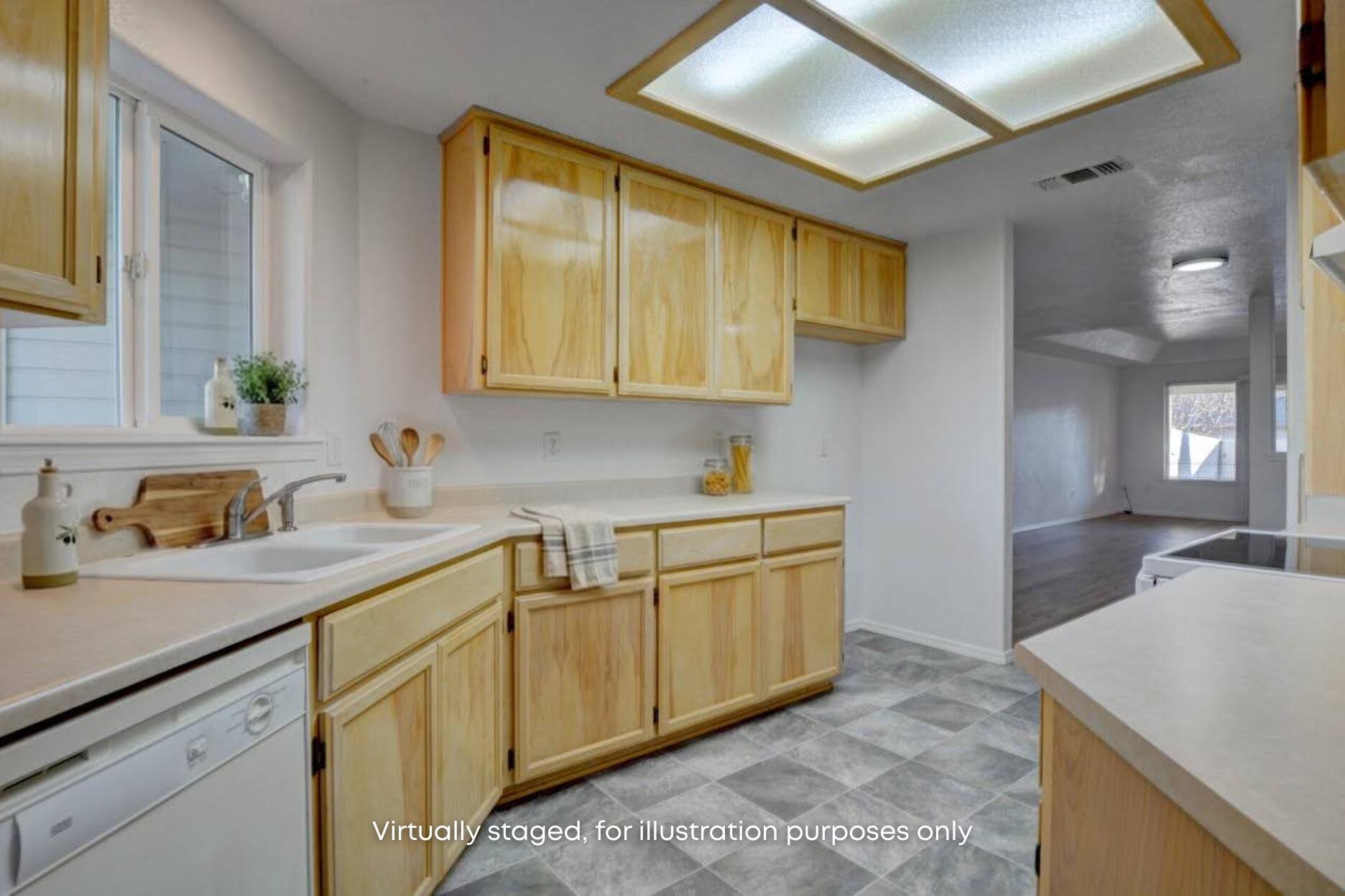 417 Crystal Drive Eagle Point, OR 97524 - Photo 13 of 35 a kitchen with a sink and cabinets