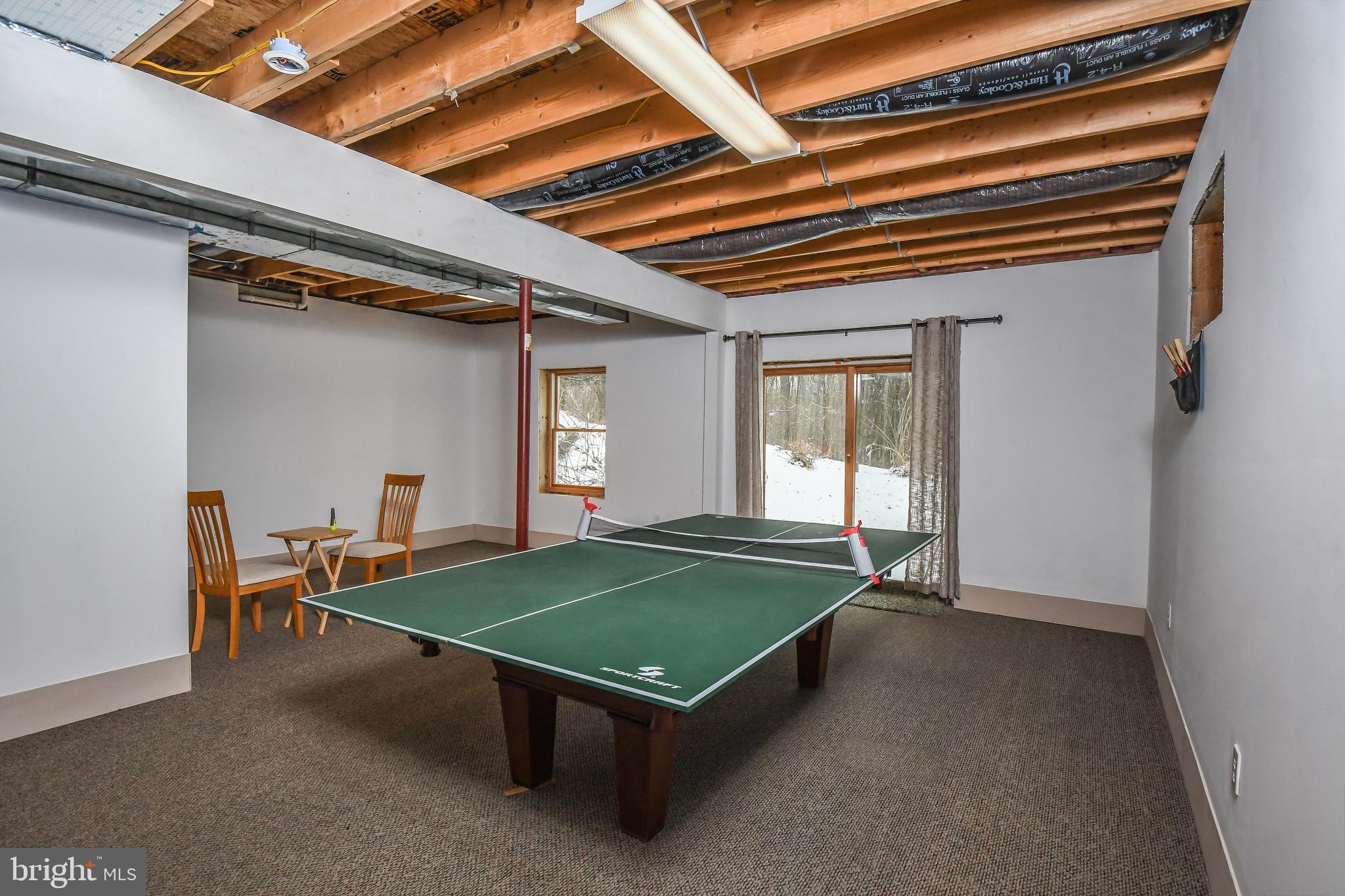 412 Tanglewood Road Oakland, MD 21550 - Photo 8 of 41 a room with pool table and windows
