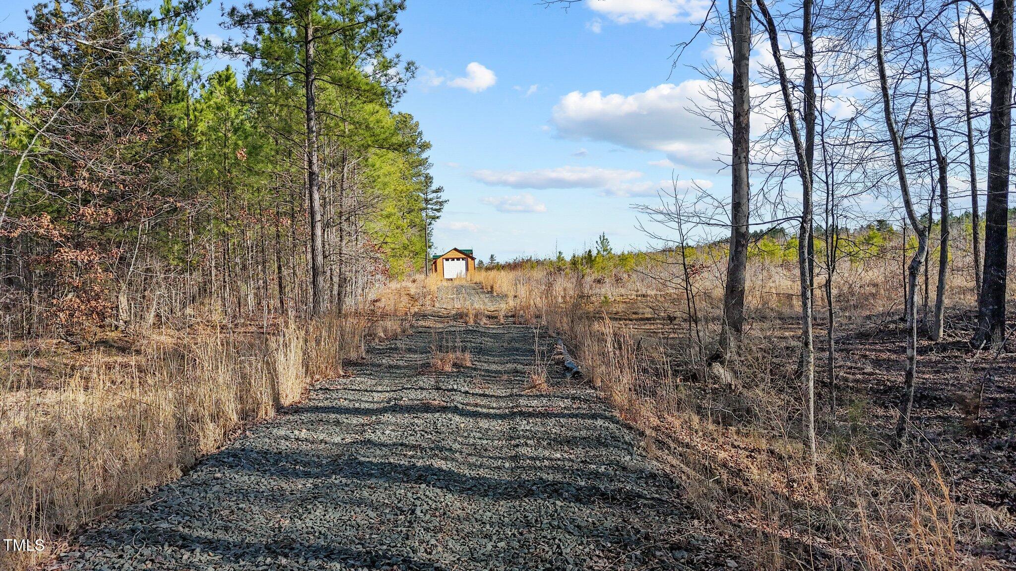 1665 Satterwhite Road Oxford, NC 27565 - Photo 11 of 41 a view of a yard and mountain view