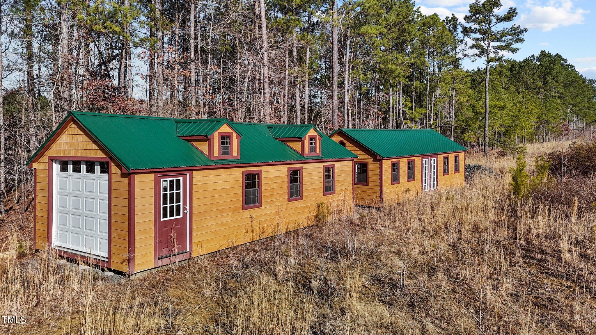 1665 Satterwhite Road Oxford, NC 27565 - Photo 3 of 41 a sign that is on the side of the house