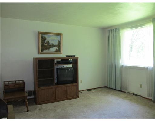 422 Slaughter Hollow Road Irwin, PA 15642 - Photo 7 of 17 Living Room. Hardwood floors found in closet and believed to be on first level.