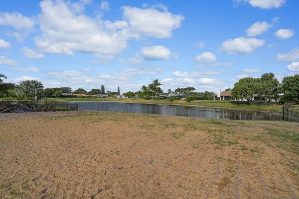 a view of a lake with a city