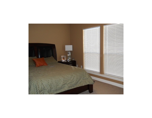 6818 Anvil Drive Corpus Christi, TX 78414 - Photo 5 of 6 a bedroom with a bed and a window