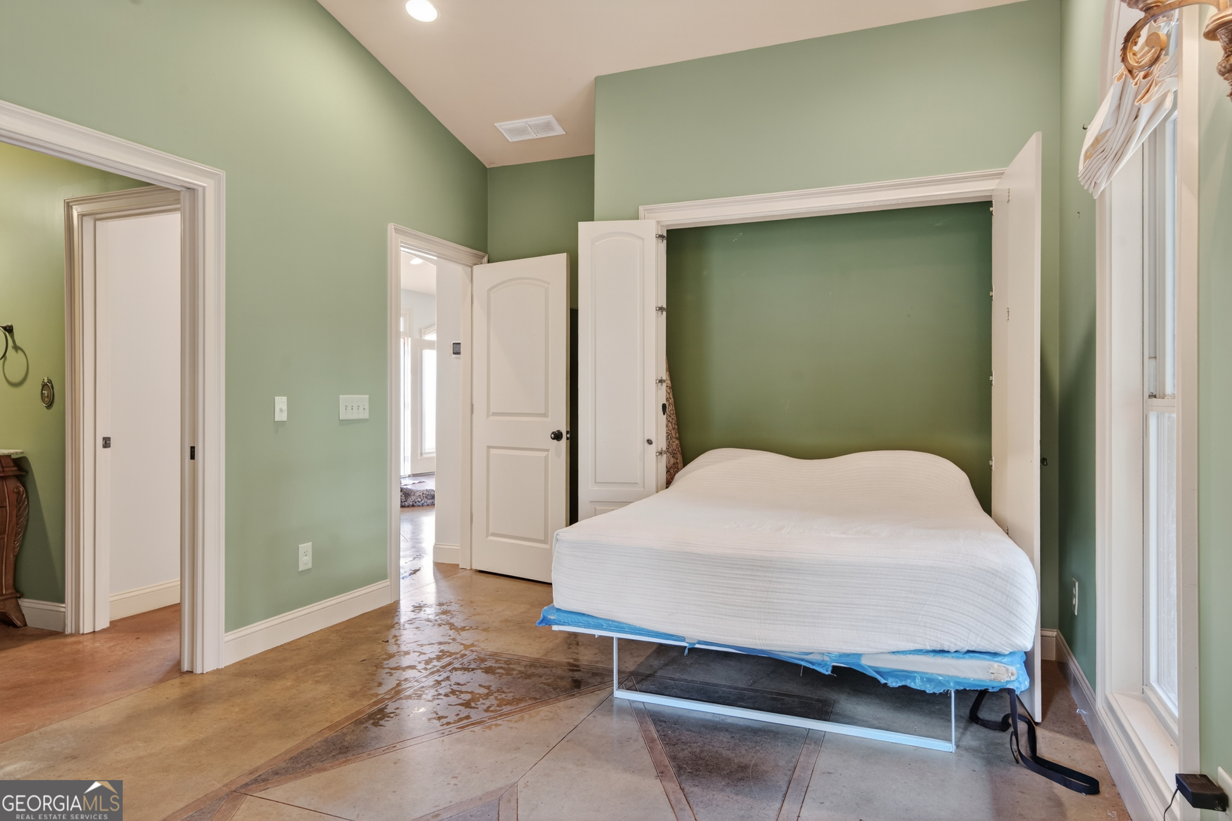 1583 Hickory Flat Road Gillsville, GA 30543 - Photo 13 of 78 a bedroom with a bed and a table