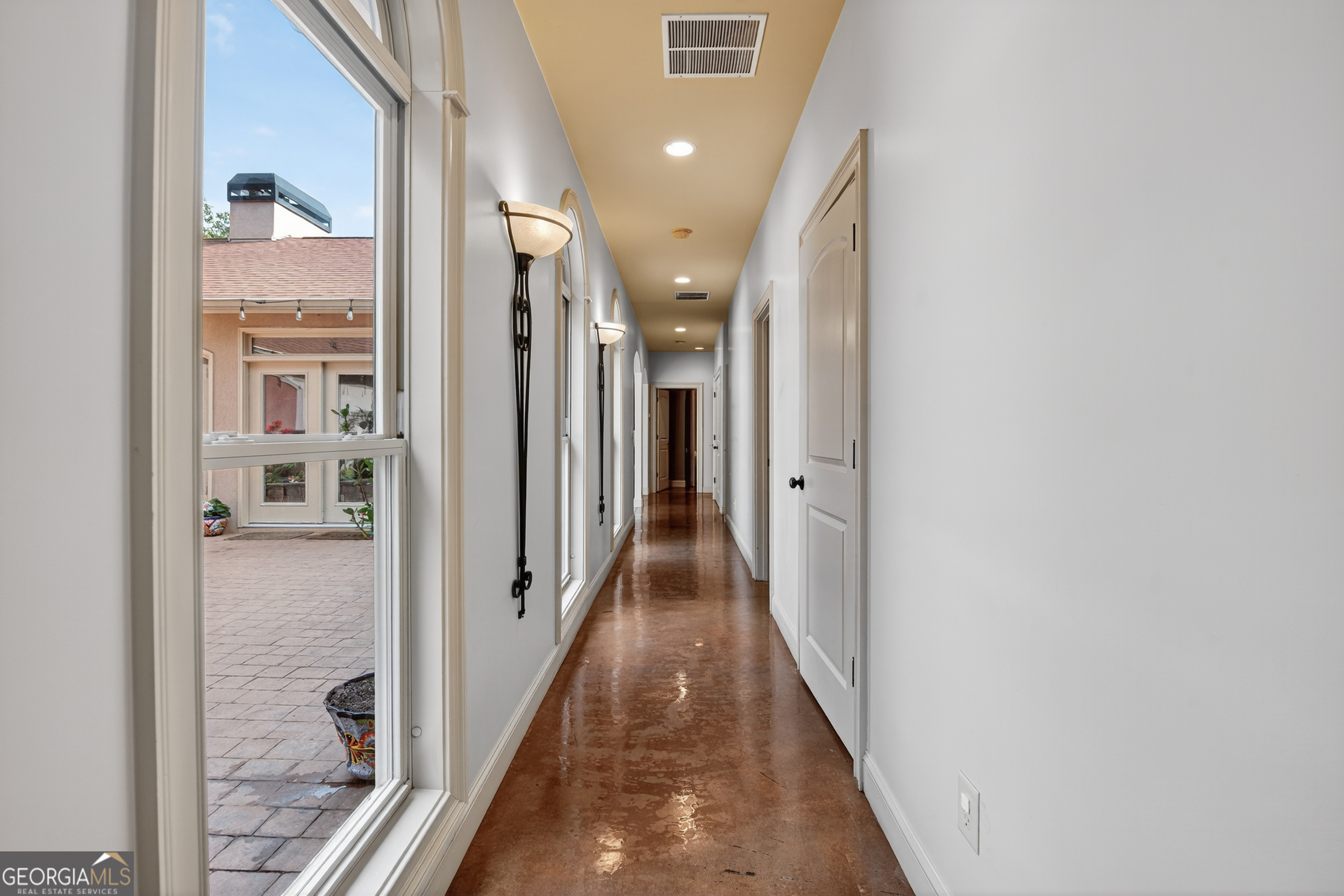 1583 Hickory Flat Road Gillsville, GA 30543 - Photo 30 of 78 a view of a hallway with wooden floor and staircase