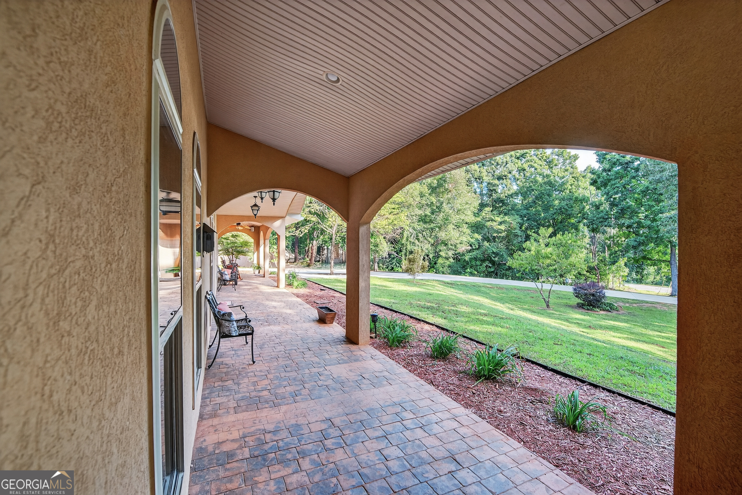 1583 Hickory Flat Road Gillsville, GA 30543 - Photo 5 of 78 a view of a porch with furniture and garden