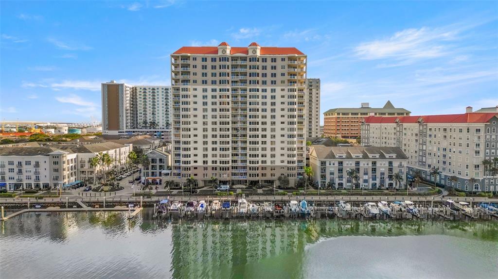 371 Channelside Walk Way, Unit 902 Tampa, FL 33602 - Photo 13 of 50 a view of a lake with a building