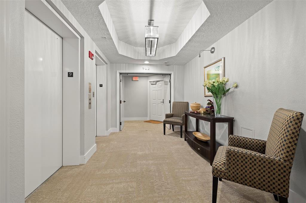 371 Channelside Walk Way, Unit 902 Tampa, FL 33602 - Photo 15 of 50 a view of a livingroom with furniture and a window