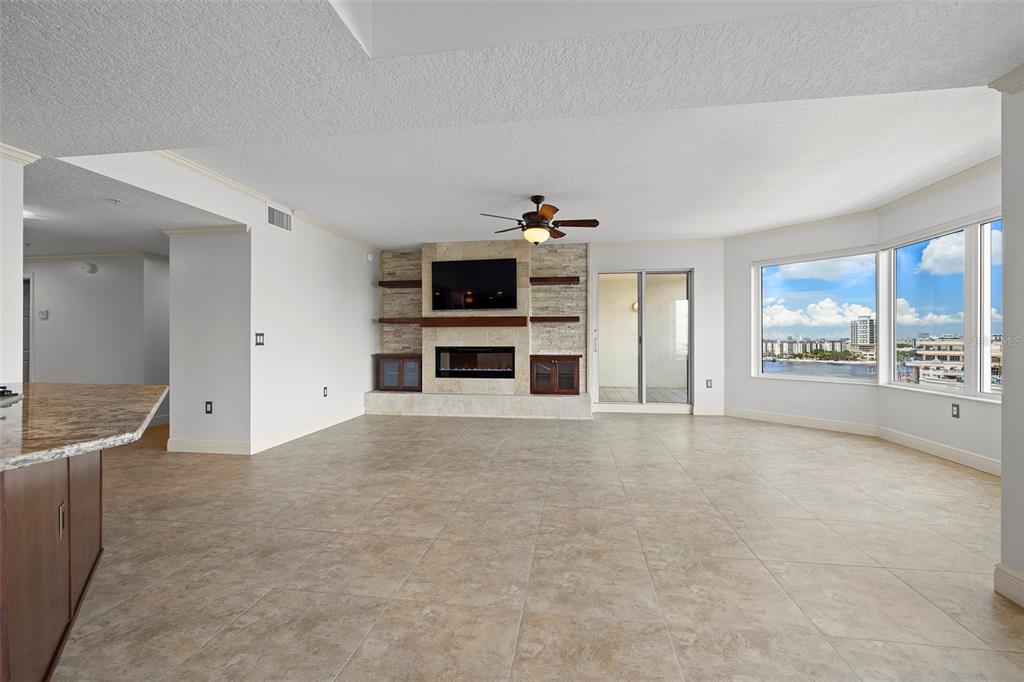 371 Channelside Walk Way, Unit 902 Tampa, FL 33602 - Photo 22 of 50 an empty room with a empty space and windows