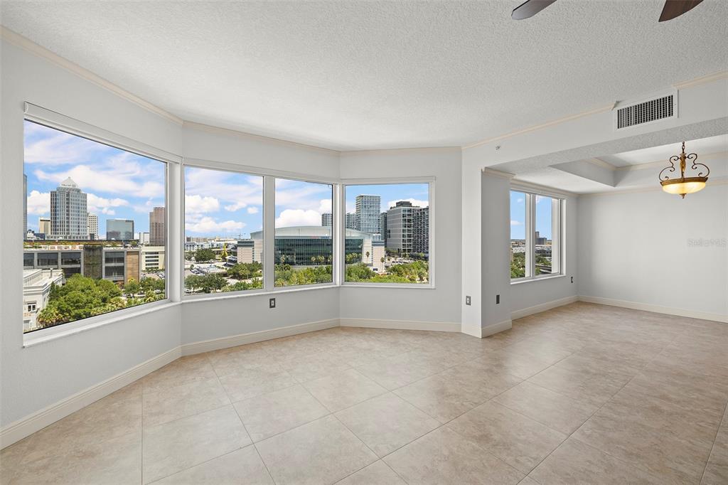 371 Channelside Walk Way, Unit 902 Tampa, FL 33602 - Photo 23 of 50 an empty room with windows and view