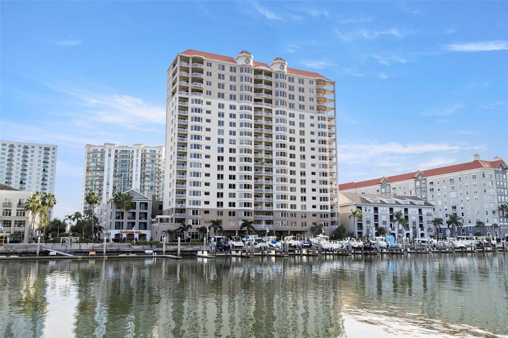 371 Channelside Walk Way, Unit 902 Tampa, FL 33602 - Photo 3 of 50 a view of a large building with a lake view