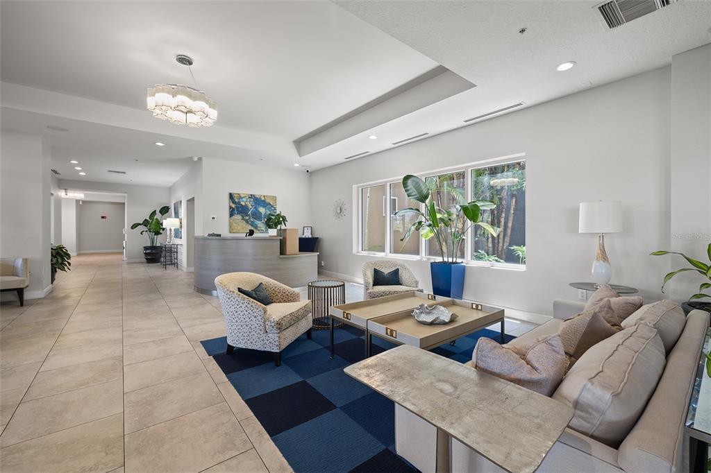 371 Channelside Walk Way, Unit 902 Tampa, FL 33602 - Photo 49 of 50 a living room with furniture and window