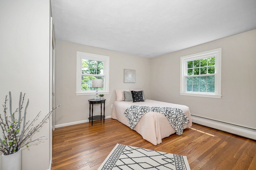 28 Wingate Road Waltham, MA 02451 - Photo 15 of 31 a bedroom with a large bed and a window