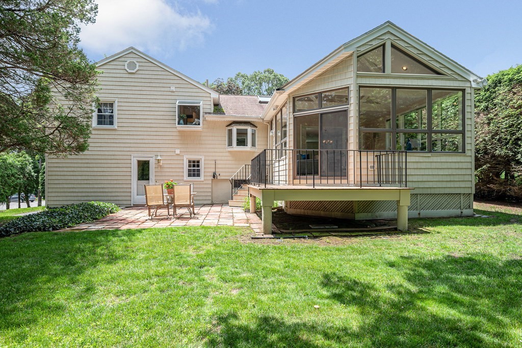 28 Wingate Road Waltham, MA 02451 - Photo 2 of 31 a front view of a house with a yard and porch