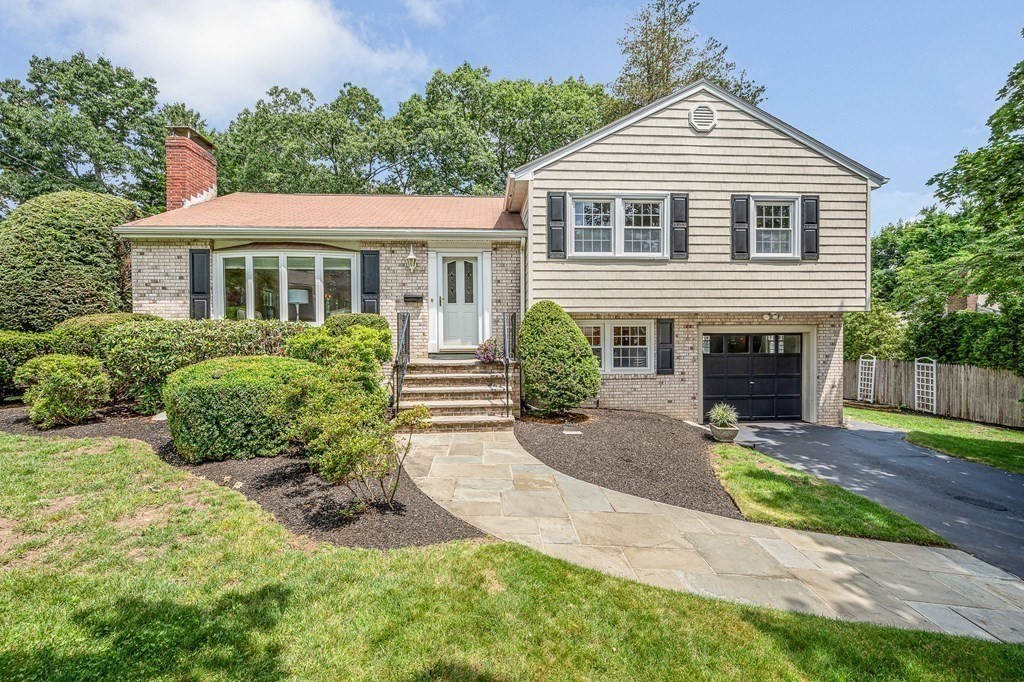28 Wingate Road Waltham, MA 02451 - Photo 26 of 31 a front view of a house with a yard