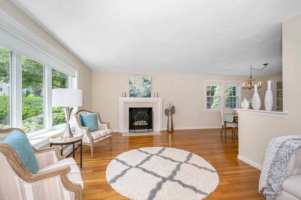 28 Wingate Road Waltham, MA 02451 - Photo 4 of 31 a living room with furniture and a fireplace