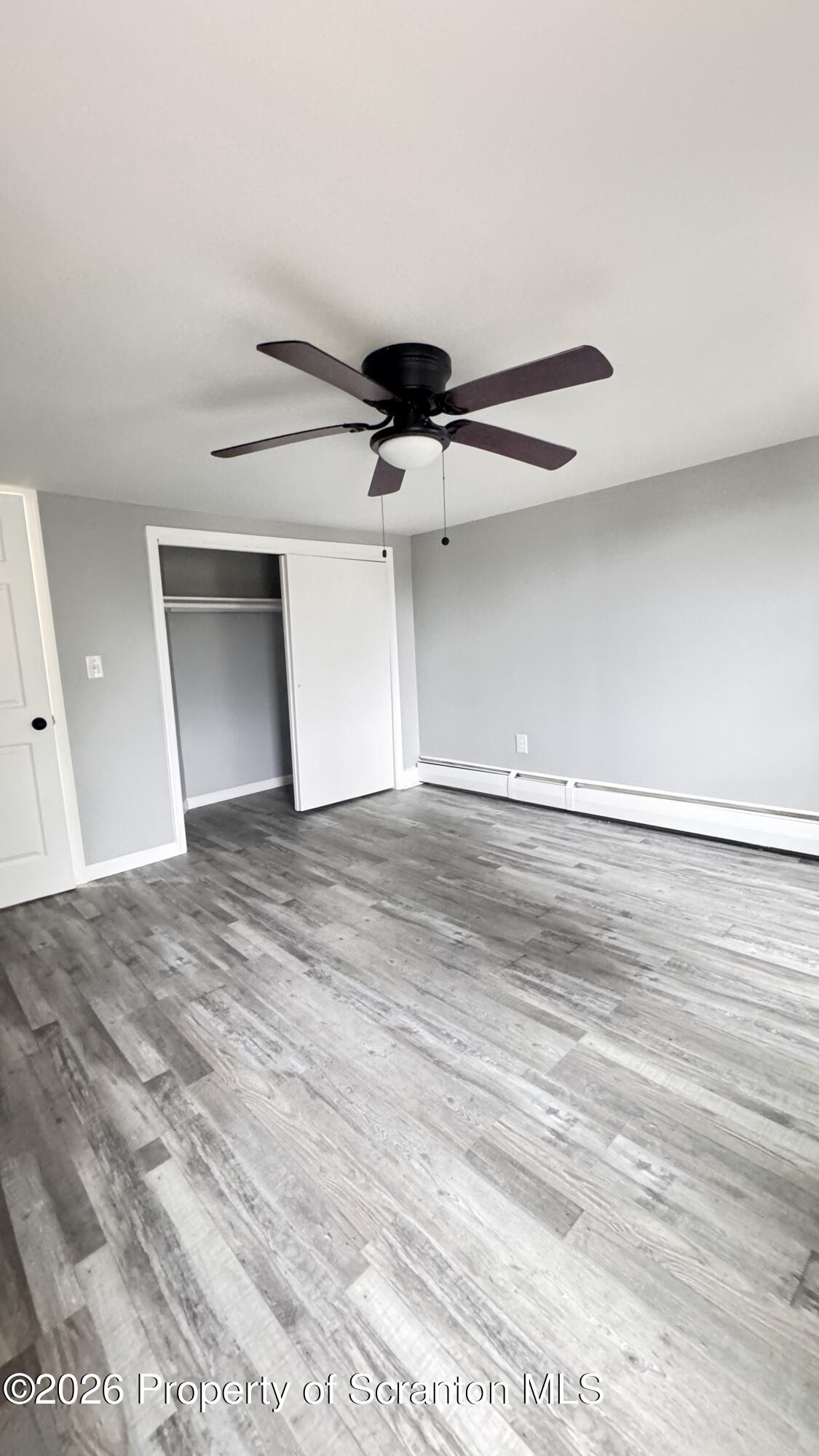 23-25 Shannon Street Simpson, PA 18407 - Photo 14 of 17 a view of a big room with wooden floor