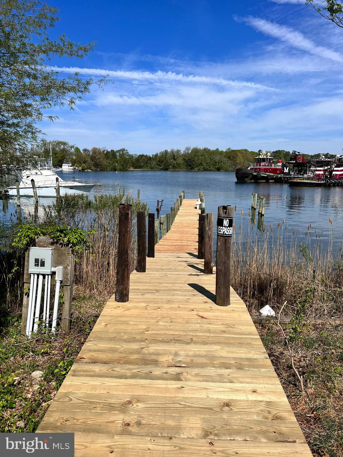 13370 Rousby Hall Road Lusby, MD 20657 - Photo 3 of 9 Shared pier, electric source as is. Deep water.